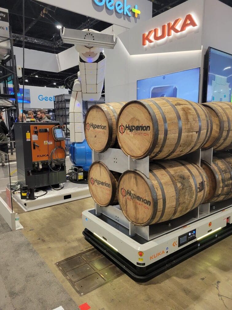 A group of wooden barrels on a rack AI-generated content may be incorrect.
