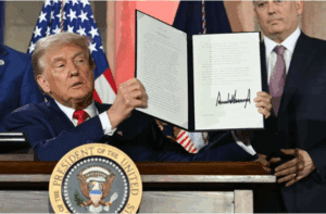 President Trump displays an executive order on artificial intelligence he signed in Washington, DC, on July 23, 2025.Andrew Caballero-Reynolds/AFP via Getty Images